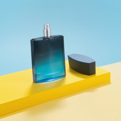 맞춤형 100ml 정사각형 유리 고급 및 우아한 빈 향수 병 펌프 스프레이어 경사 검은색과 파란색 15mm 목