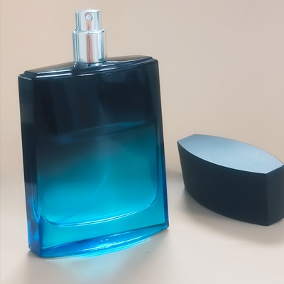 맞춤형 100ml 정사각형 유리 고급 및 우아한 빈 향수 병 펌프 스프레이어 경사 검은색과 파란색 15mm 목